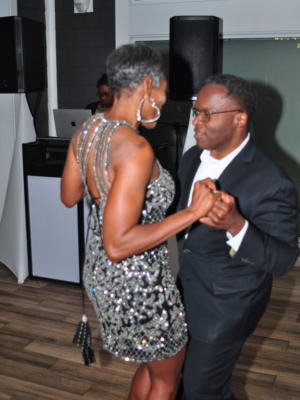Paul Williams and his wife Jill dancing after the awards at the 2nd Annual Difference Makers Gala