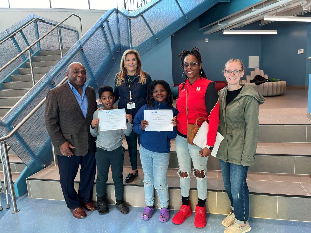 In the photo, from left: William Collick, Jaybreon Mifflin, Dr. Kimberly Corbidge, Principal, Skylar Hampton, Shukri Gibbs, and Michelle Teed.