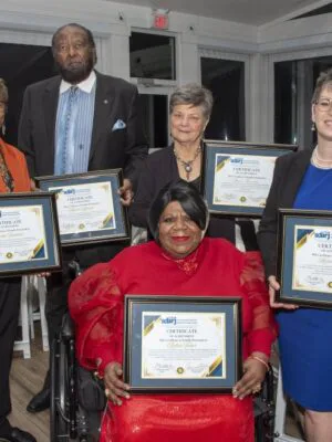 Volunteers are the backbone of the organization. The committee chairs were recognized for their contributions. Shown are (l-r) Sandy Baynard, Melvin Mitchell, Sharon Bernstein and Michele Warch. Seated is Robin Fisher. Not shown are Jacob Schiavo and Clara Licata.