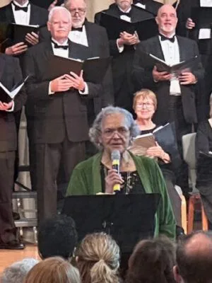 Charlotte King speaking at the Chorale event in 2024