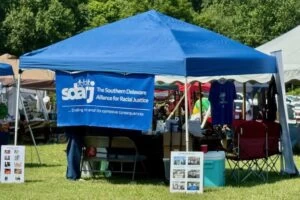 Southern Delaware Alliance for Racial Justice Joins Juneteenth Celebration in Georgetown Booth Back