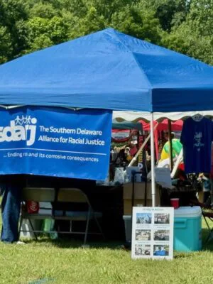 Southern Delaware Alliance for Racial Justice Joins Juneteenth Celebration in Georgetown Booth Back
